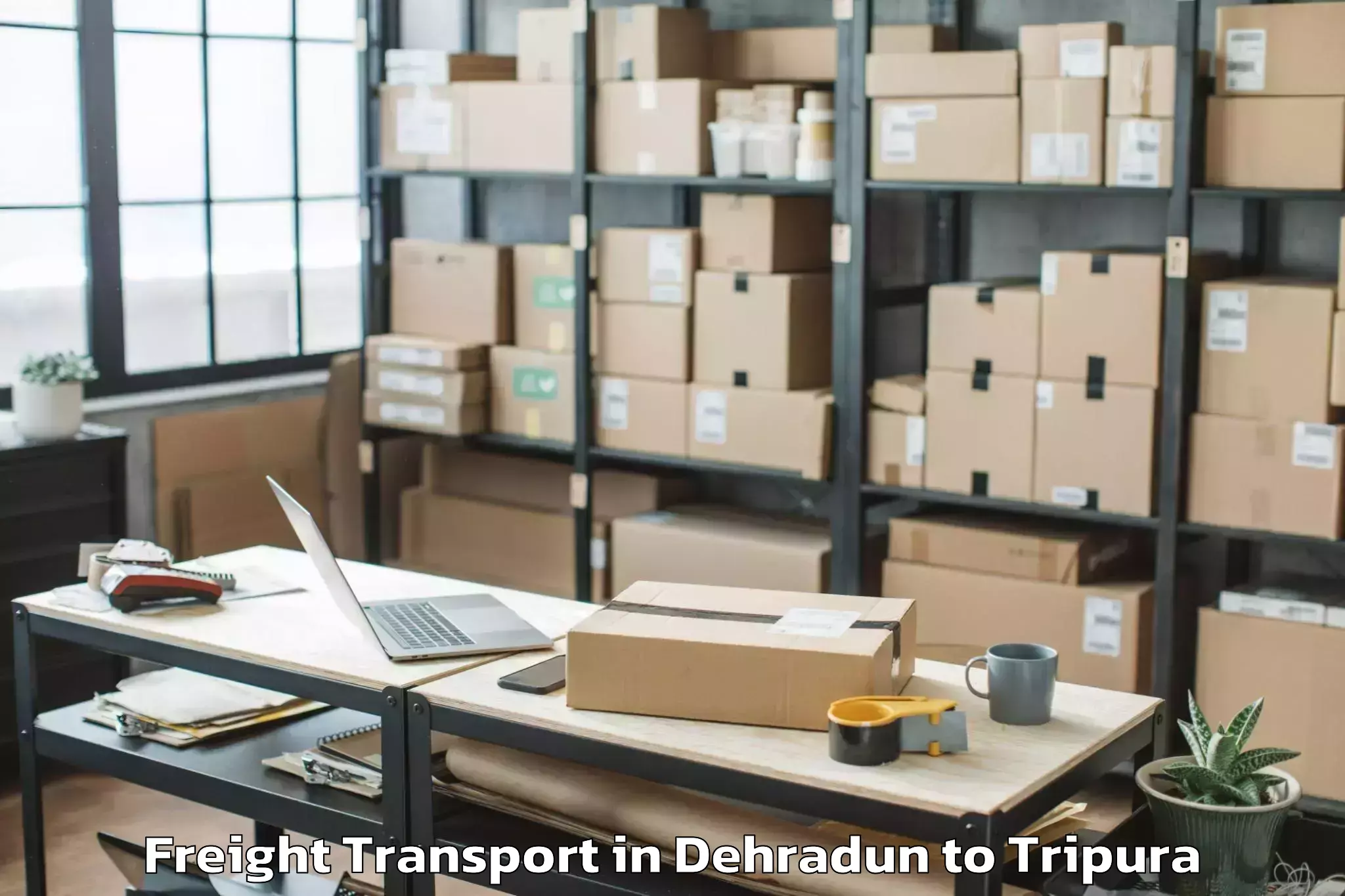 Book Your Dehradun to Kamalpur Airport Ixq Freight Transport Today